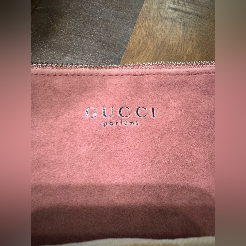 Lightly used. VIN Gucci  and YSL  Cosmetic cases ( lot of 2)